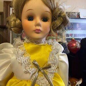 Elegant Yellow and White Doll with Lace Details